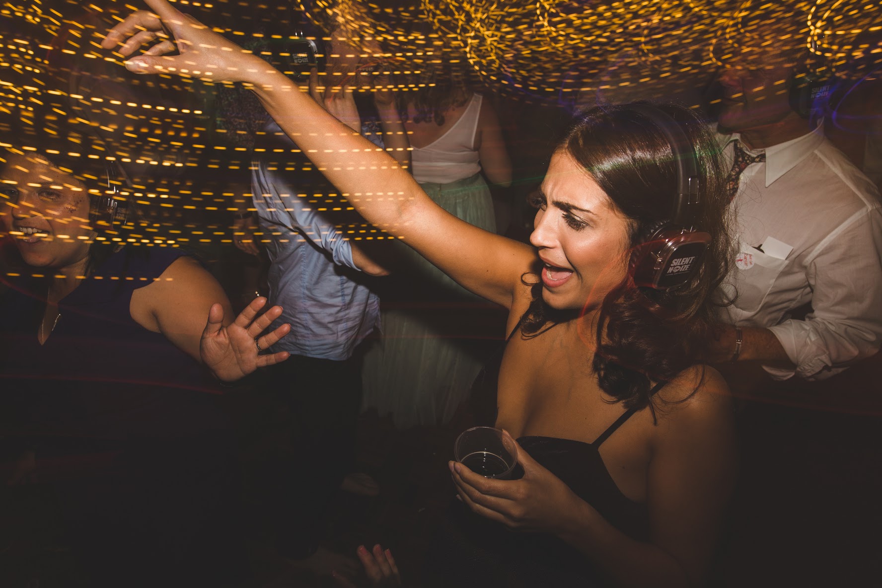A girl partying at a silent disco party