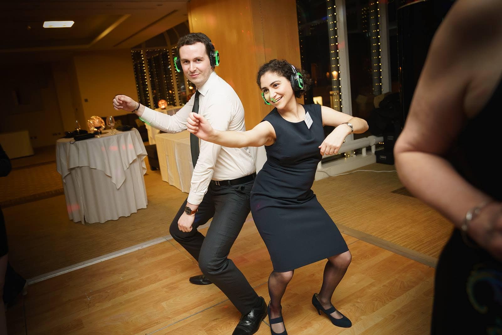 A couple dancing at a corporate party