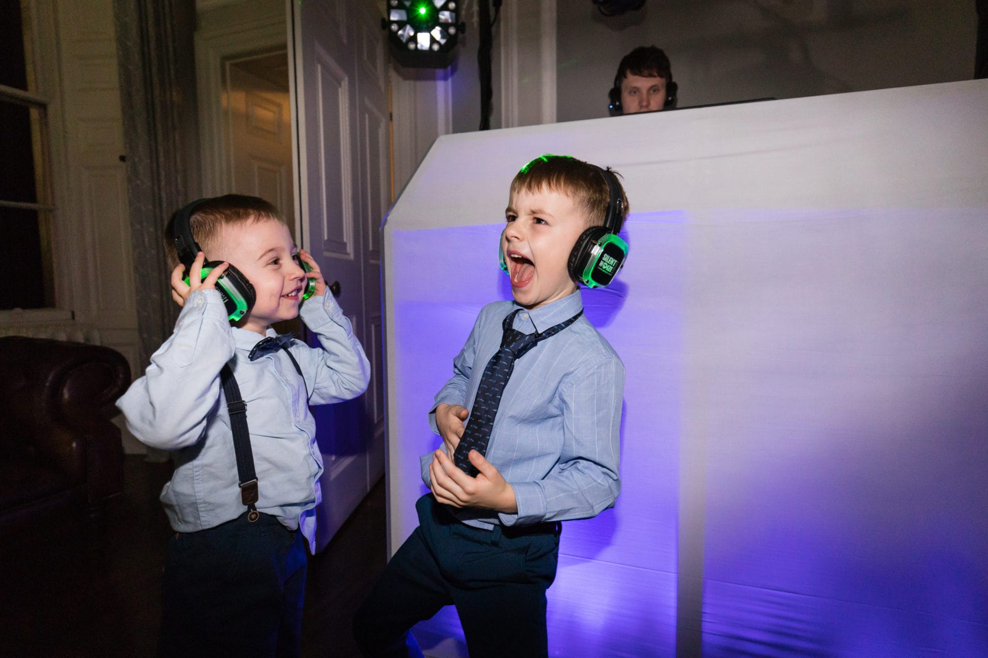 Two young boys in headphones
