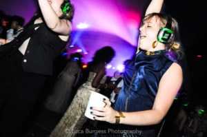 Two girls dancing at the silent disco
